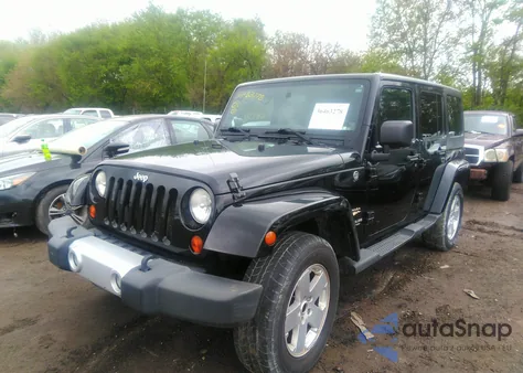 2011 Jeep Wrangler Unlimited Sahara from USA, damaged, VIN 1J4BA5H18BL593750